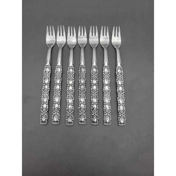 Set 7 Oneida Northland Stainless Floral Houston Cocktail Fork Japan Discontinue - Picture 1 of 5